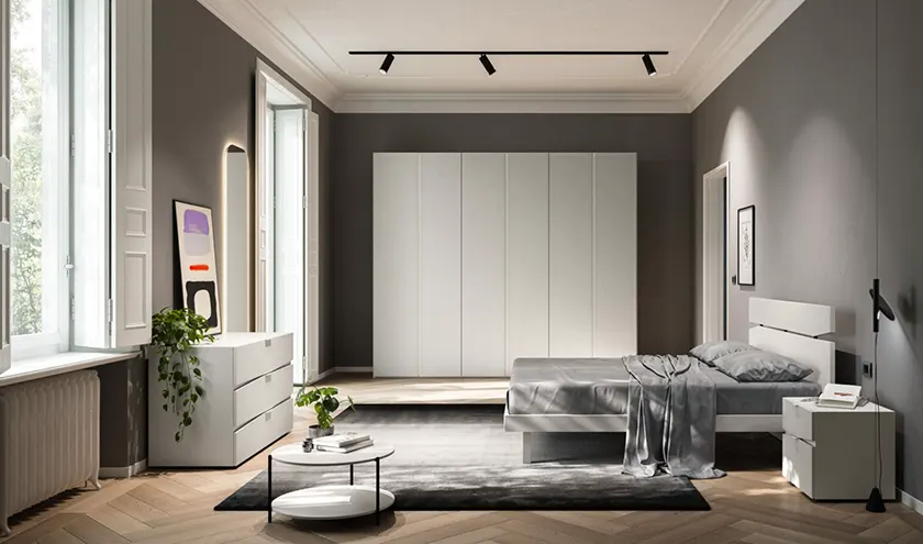 Composizione letto Contra con giroletto Alfa, gruppo Slant in Seta con frontali in Cemento Tropea, armadio battente Tratto, Orme Design programma notte Light
